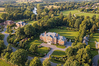 showcase georgian brick mansion, manor village building, lush countryside render