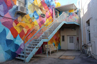 paint real graffiti art on the street wall