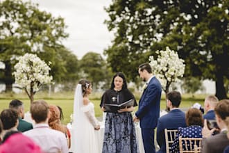 write your full wedding ceremony script in english, portuguese or spanish