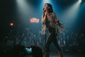 write and sing custom country music with bluegrass guitar and cowgirl vocals