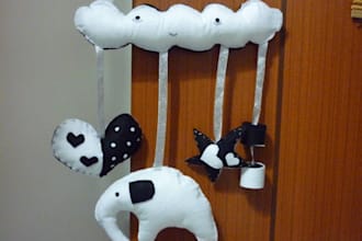 create a black and white brain stimulating mobile for baby/pets using felt