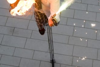 ride my 13 foot unicycle and juggle fire torches