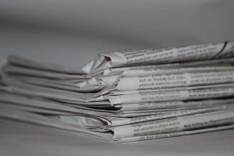 translate news articles into spanish, english or romanian