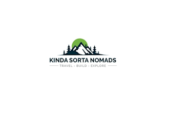 nomadic travel alternative living brand logo