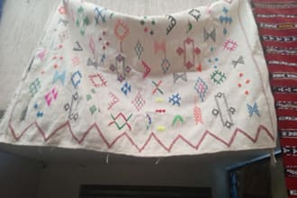 deliver a unique moroccan carpet from the atlas mountains
