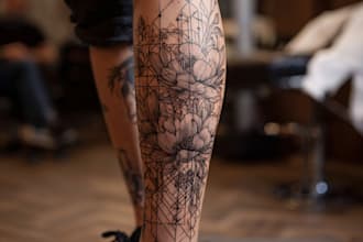 create a tattoo design for leg sleeve