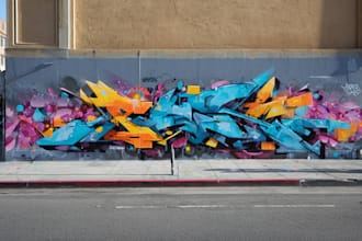paint real graffiti art on the street wall