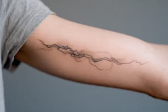 create a minimalist fine line tattoo design
