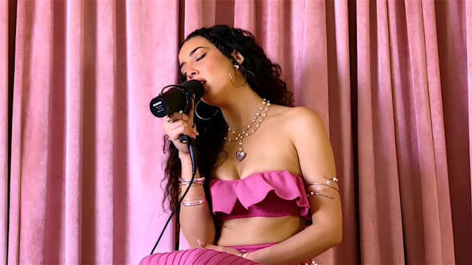 write and sing authentic female world pop music
