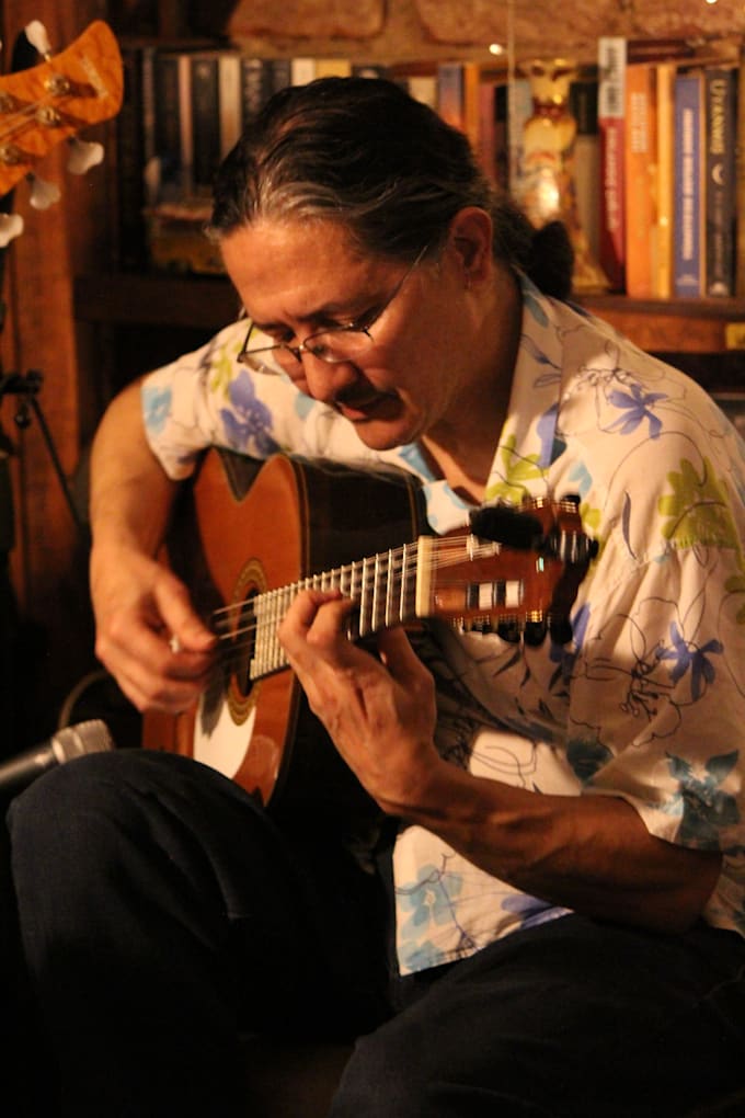 teach personalized online guitar lessons with a professional guitarist