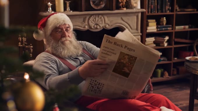 Gig Preview - Make santa claus reading newspaper christmas greeting video