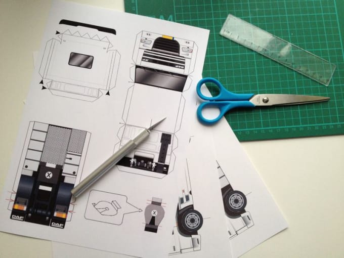 Gig Preview - Design a custom made paper model with your logo on it