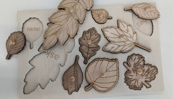 Bestseller - make a puzzle with danish tree leaves made from the timber of those trees