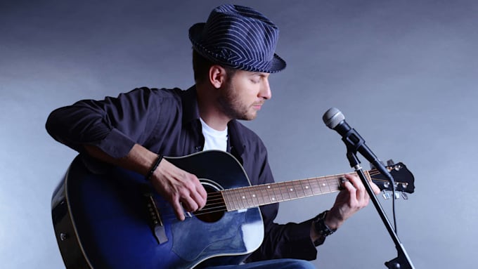 Gig Preview - Sing a nashvile country song folk pop song as acoustic male vocalist guitarist