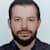 Emre E.