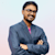 Uttam E.