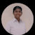 Dinsha M
