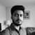 Tushar R