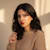 Komal B