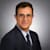 Zaher F