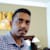 Dinesh E