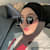 Munisa S