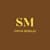 Syntia M