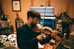 compose and produce music using live orchestral strings, piano, bass, percussion