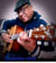 make you learn to play any song of your choice on guitar