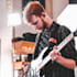 give professional guitar lessons online