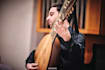 play lute and ancient plucked strings instruments