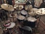 record acoustic drums or program an electronic drum for your song