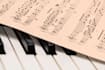transcribe to score the songs you want to play on the piano