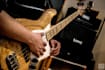 teach you how to play bass guitar