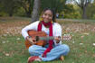teach you guitar and enhance your performance skills
