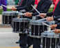 arrange drumline music at an intermediate high school level