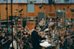 compose orchestral music, arrange strings, and create cinematic scores