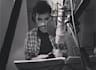 record a deep spanish voice over warm and professional