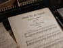 compose a custom piano accompaniment for your song