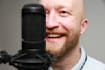 record a male voice over for your advertisement