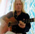 give you guitar lessons