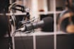 record a charming warm american male voice over in english or gritty