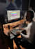 produce a custom pop, rock or metal song for you