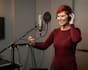 be a warm female voice over