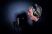 produce a female german voice over in a deep and charming voice