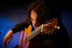 compose or arrange for guitar or ensemble