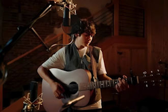 sing country and indie folk vocals with acoustic guitar and soulful songwriting