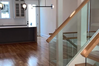 create professional staircase railing designs in glass, steel, and wood