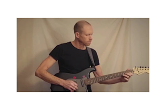 give you guitar lessons
