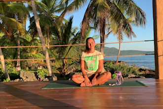 film a yoga, aerial yoga or meditation video in front of the ocean